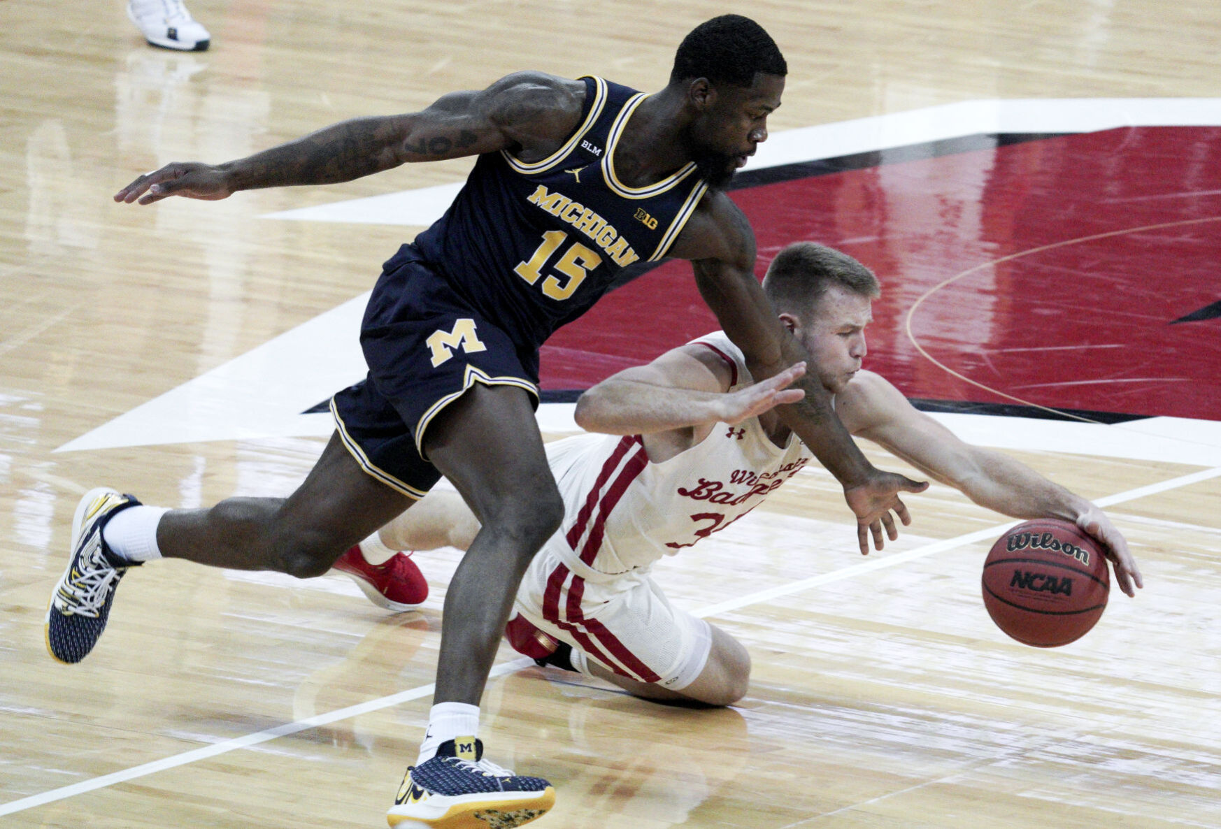 Michigan 67, UW 59